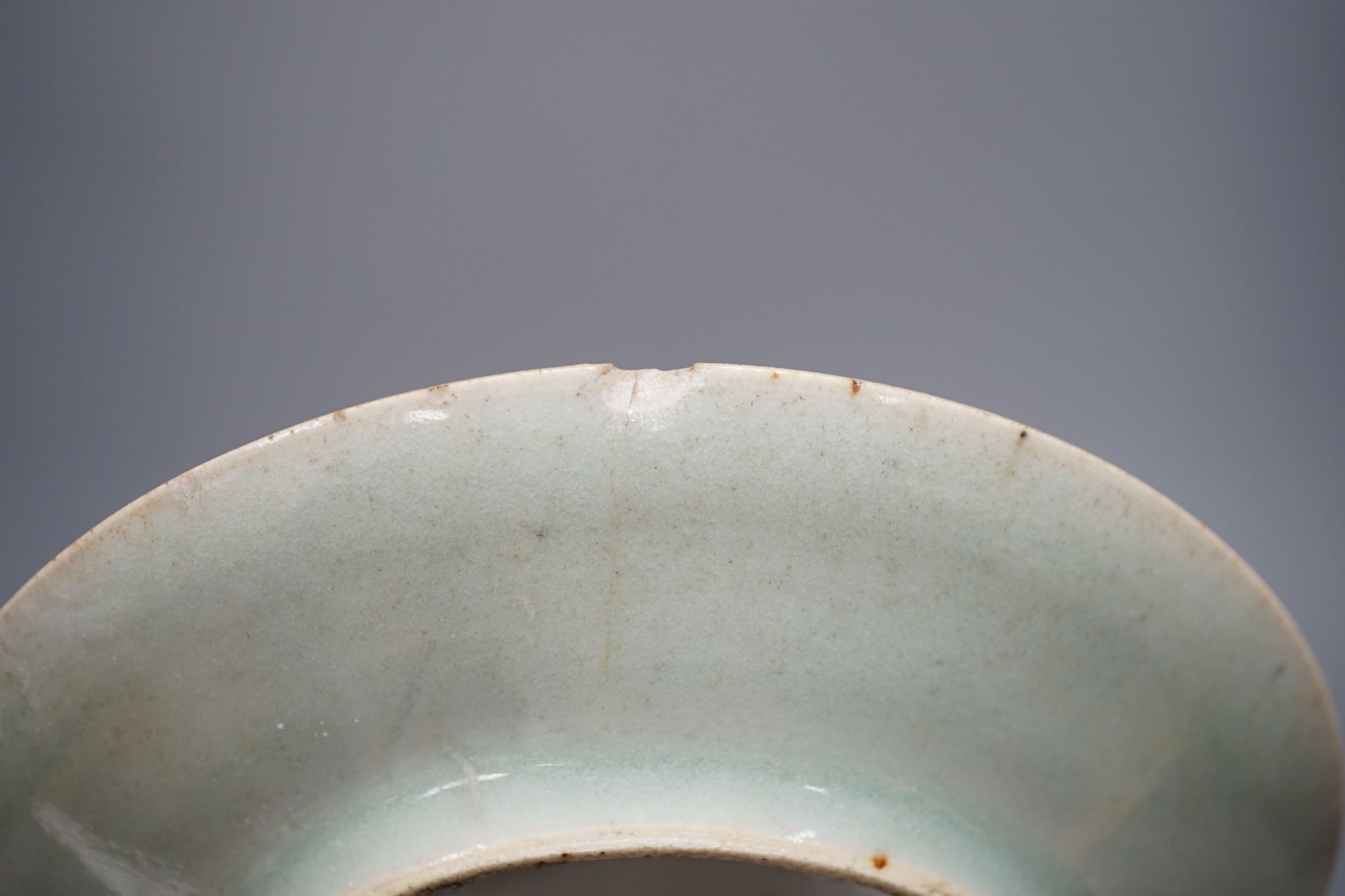 A Chinese export blue and white dish, 13cm, similar vase, a miniature crackle ware vase and a celadon saucer